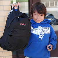 A photo of Payden with his new backpack