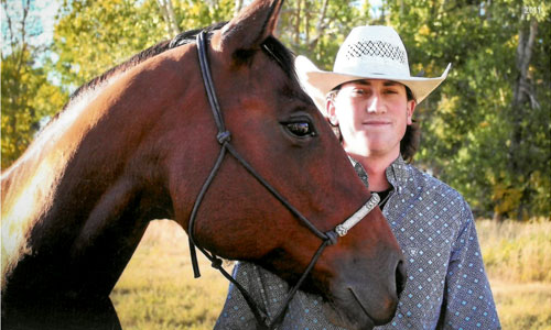 A photo of Owen and his horse