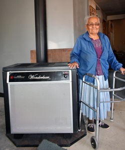 Photo of Flora with her new stove
